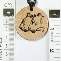 Hand Drawn Cave Lion Wood Pendant