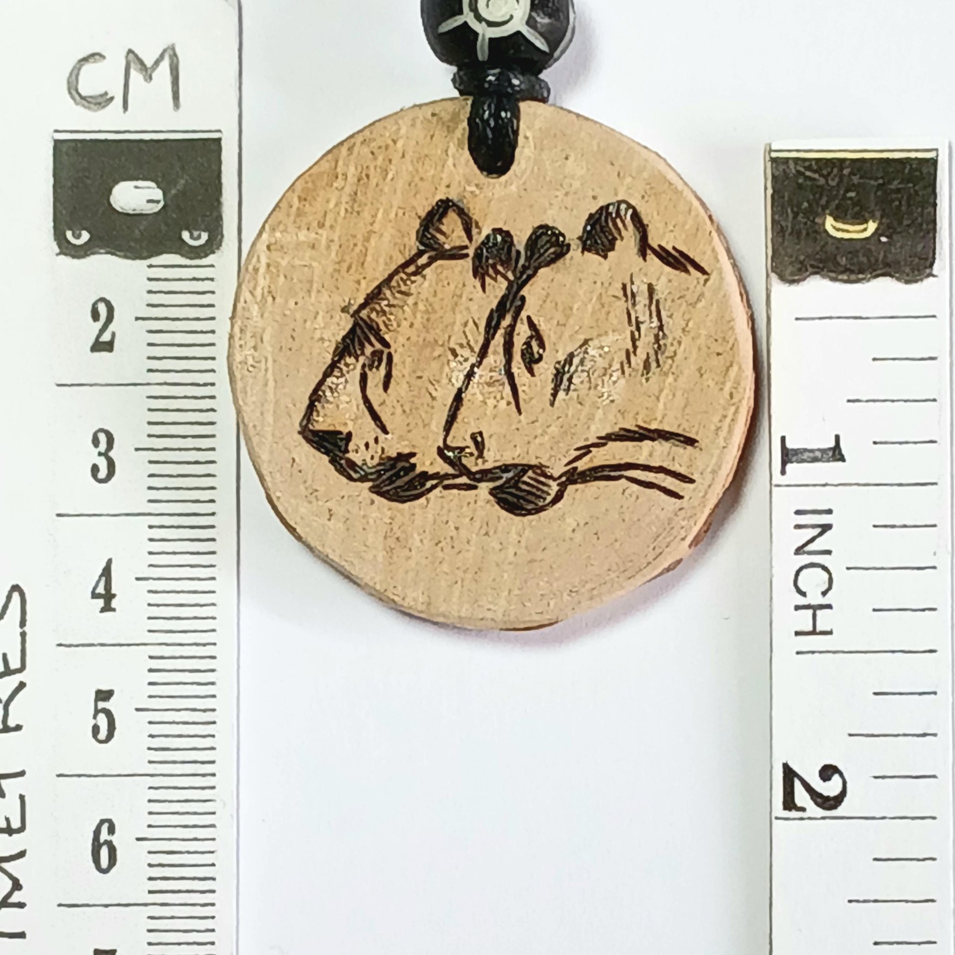 Hand Drawn Cave Lion Wood Pendant
